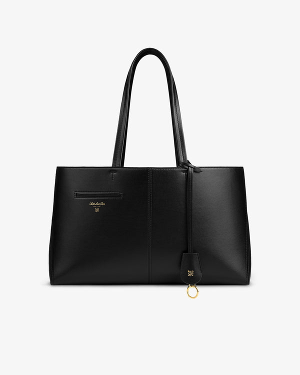 Napa Leather Shoulder Bag in black with double straps and a gold ring charm.