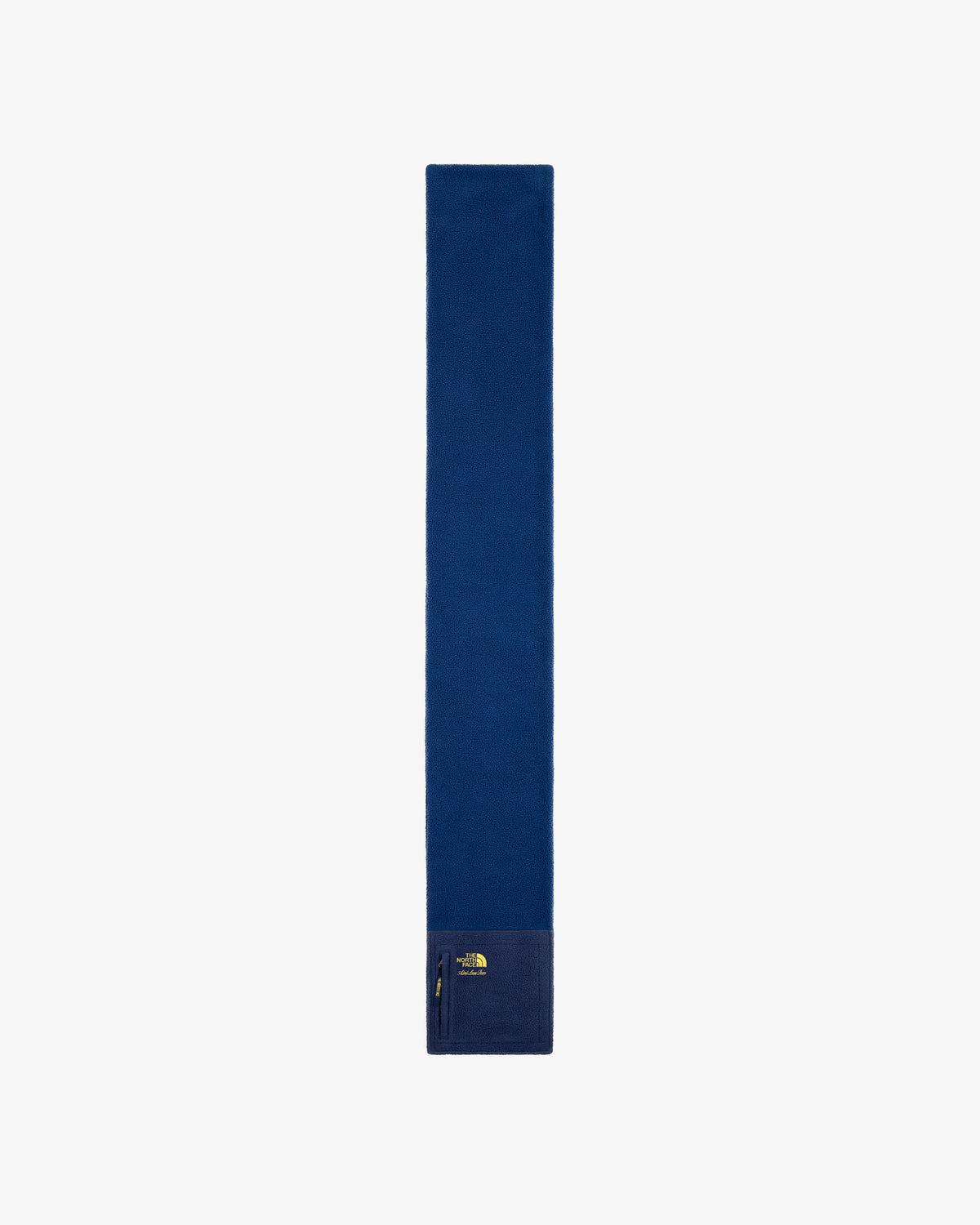 ALD / The North Face Denali Fleece Scarf in blue, with a zip pocket and logo near one end, on white background.