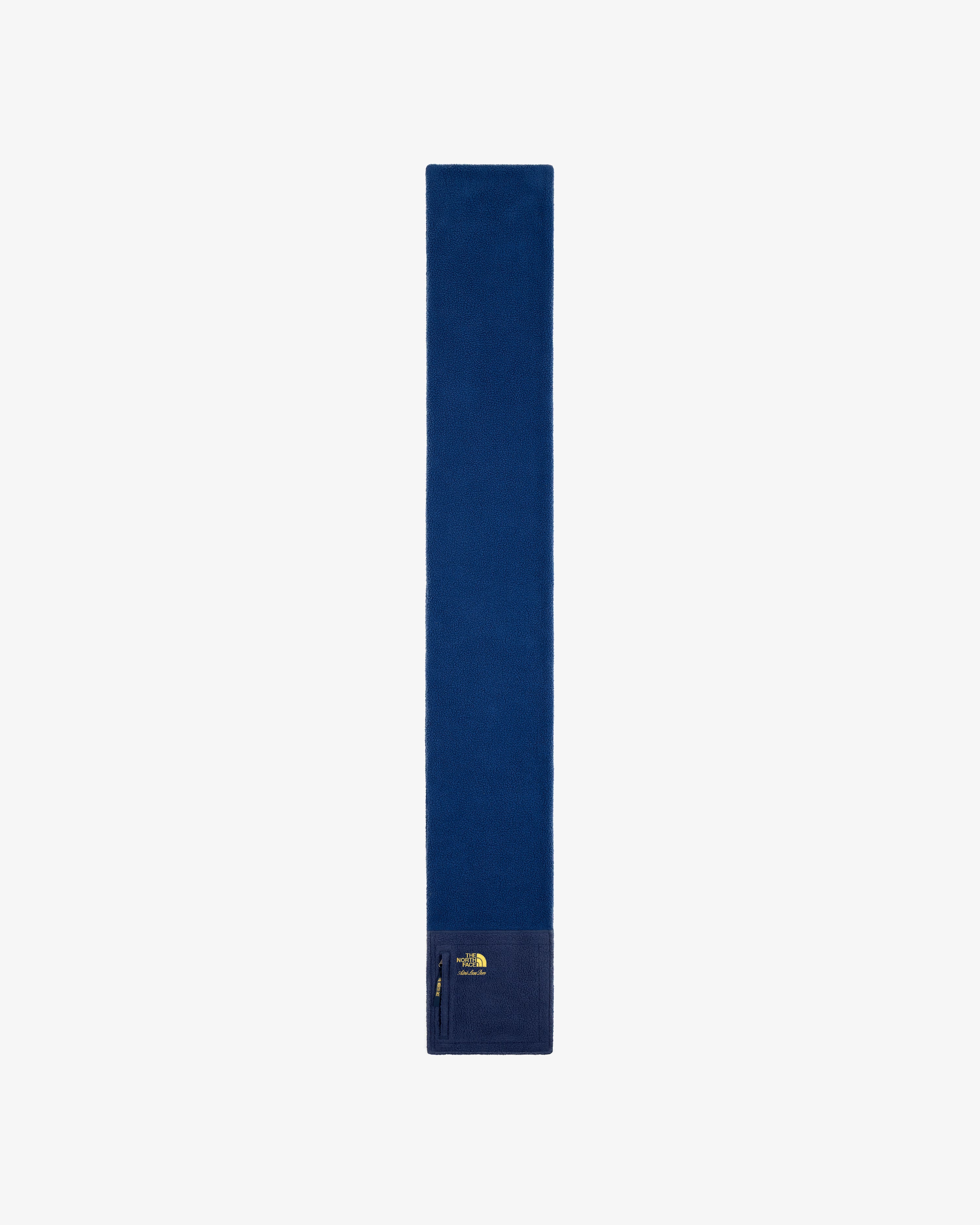 ALD / The North Face Denali Fleece Scarf in blue, with a zip pocket and logo near one end, on white background.