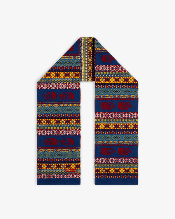 ALD / The North Face Fair Isle Scarf featuring vibrant geometric patterns, folded to a point on a white background.