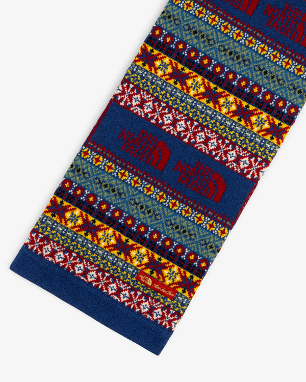The ALD / The North Face Fair Isle Scarf features a blue, red, and yellow knit pattern with woven logos.