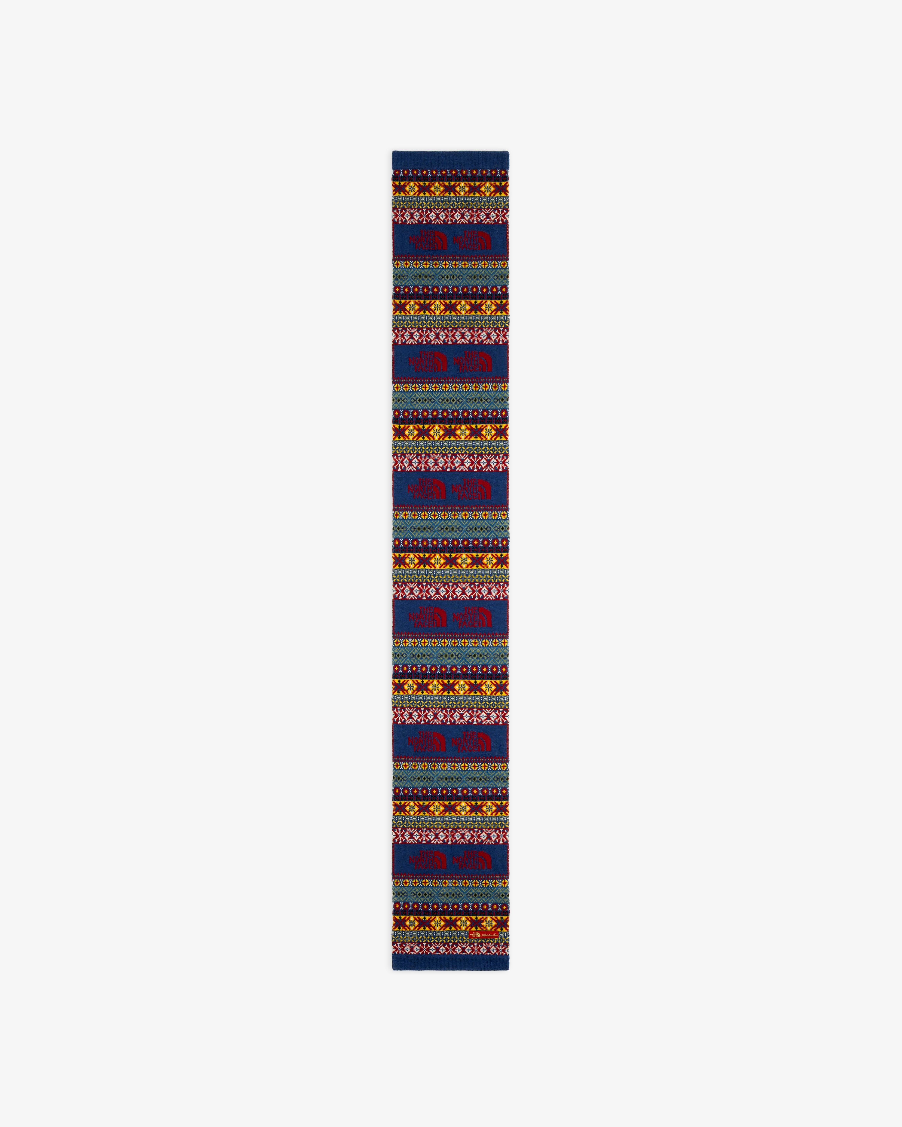 ALD / The North Face Fair Isle Scarf: Long, narrow scarf with colorful geometric and floral patterns on dark fabric.