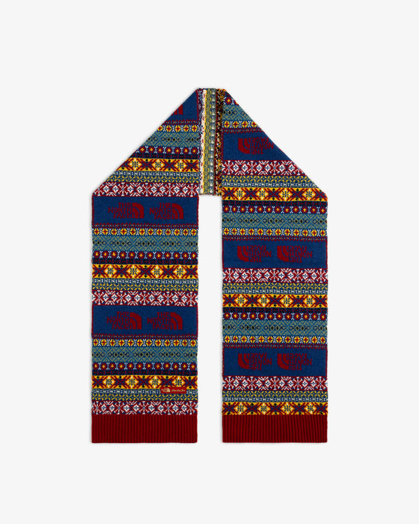 ALD / The North Face Fair Isle Scarf in blue, yellow, and red with a repeated logo pattern.