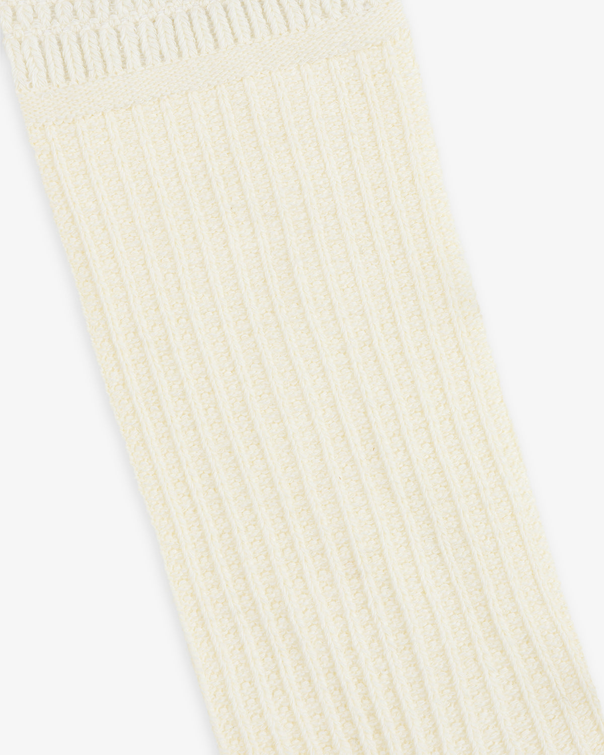 Off-white Cotton Waffle Sock with a ribbed, textured cuff.