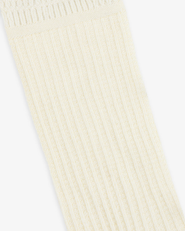 Off-white Cotton Waffle Sock with a ribbed, textured cuff.