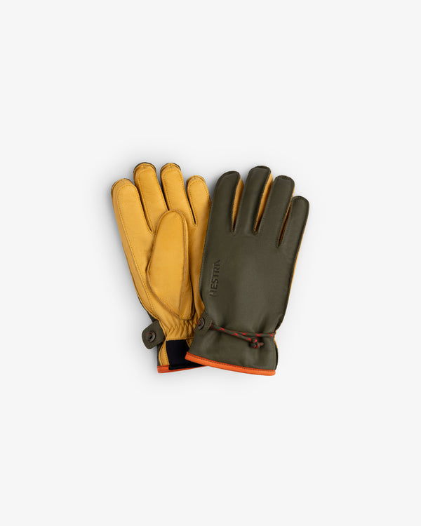 Wakayama gloves in olive green and tan leather with orange trim and a drawstring closure at the wrist.