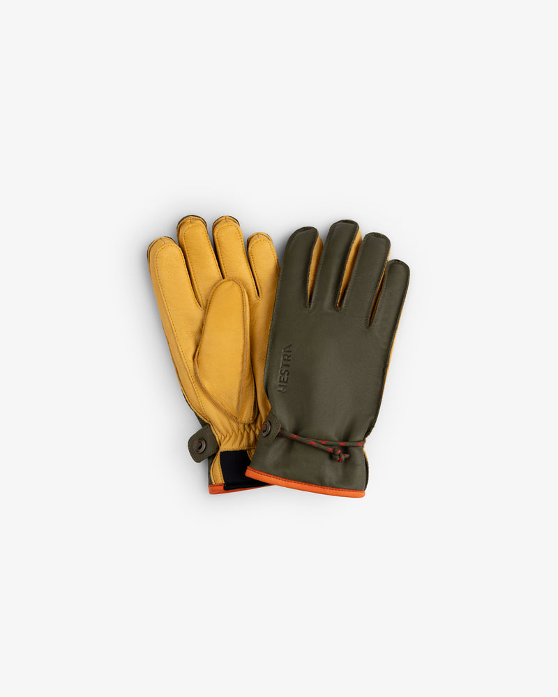 Wakayama gloves in olive green and tan leather with orange trim and a drawstring closure at the wrist.