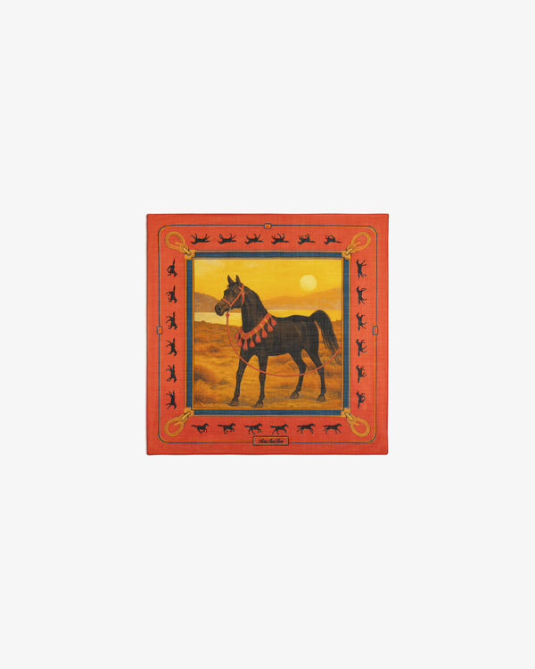 The Bayard Silk Bandana features a black horse at sunset with a red border and horse silhouettes.