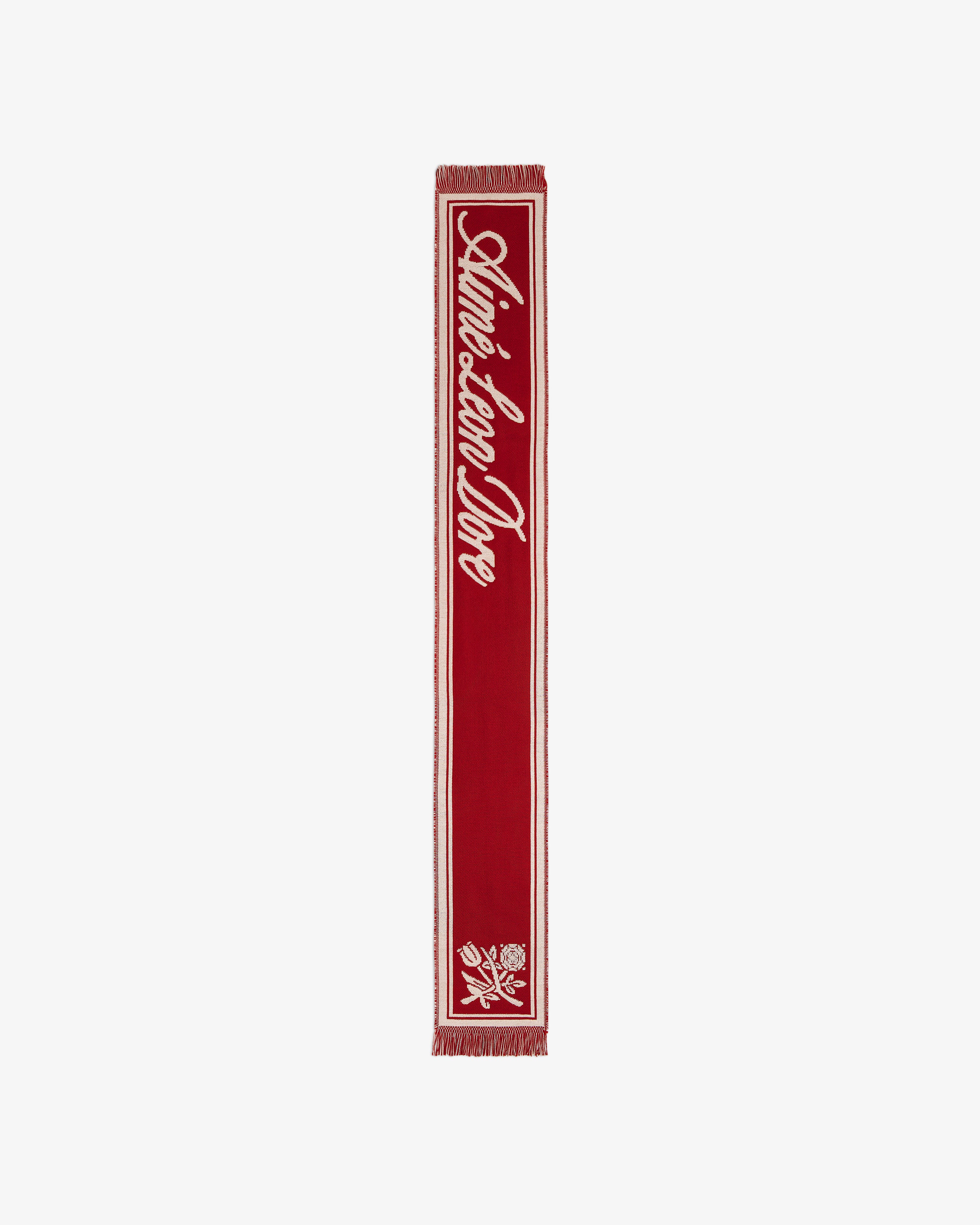 Red Wool Script Scarf featuring white script text and a floral graphic at the bottom.
