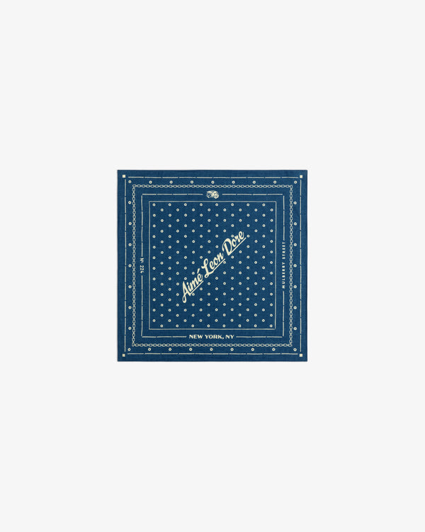 Indigo Dyed Cotton Bandana: a dark blue bandana with white polka dots and Aimé Leon Dore, New York, NY text.