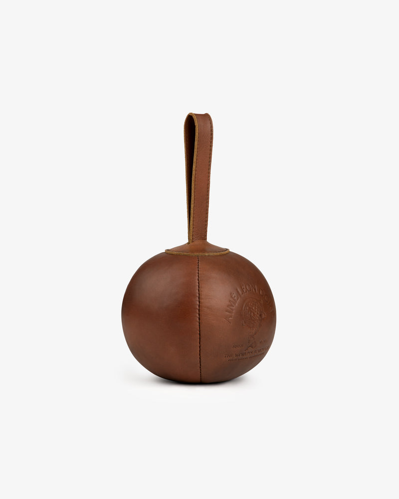 Atlas Vintage Leather 10 Lb Kettle Bell: a round brown leather kettlebell with a top handle and an embossed logo.