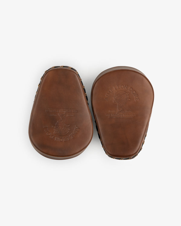 Two brown leather Atlas Vintage Leather Boxing Pads with embossed logo designs.