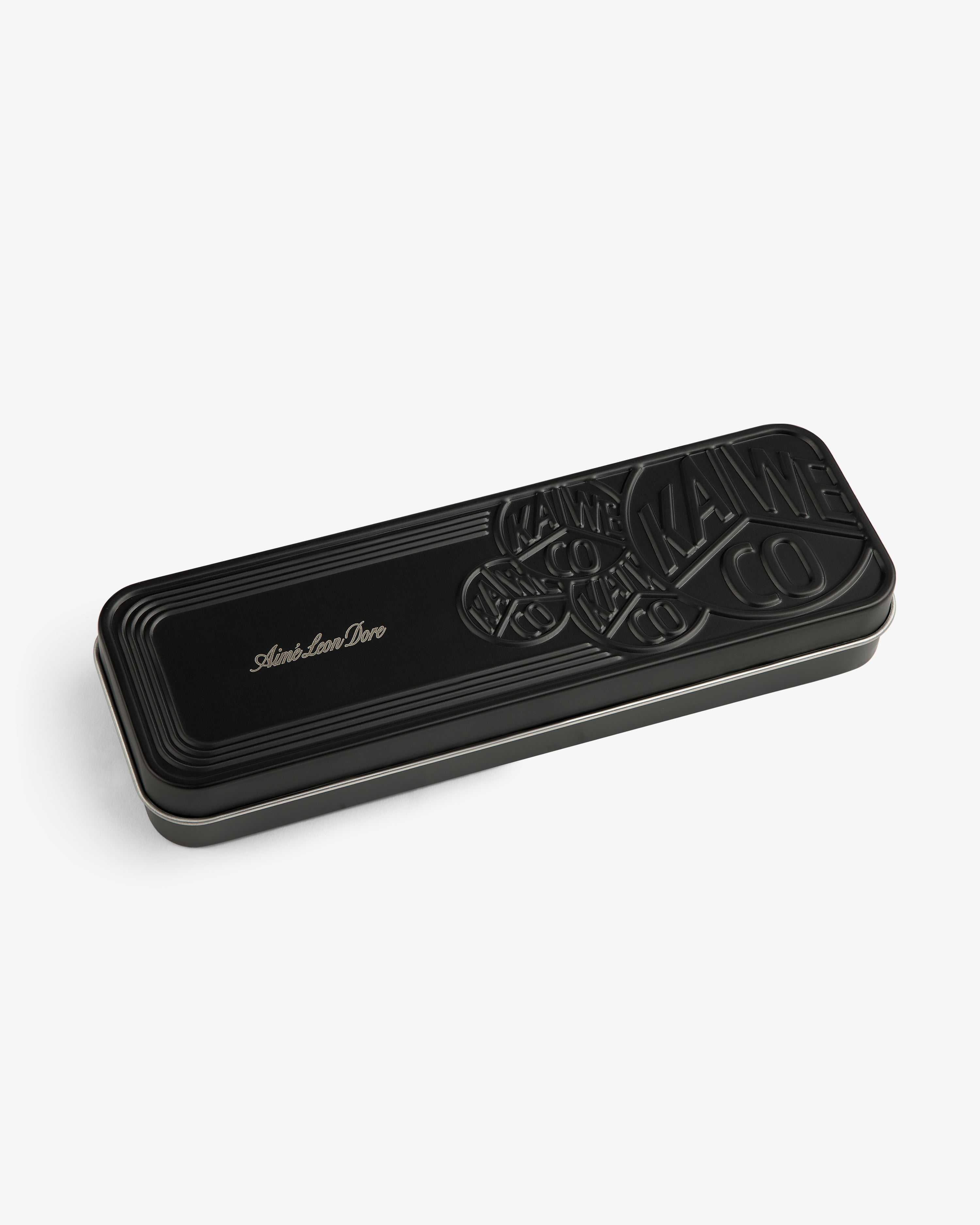 Kaweco Script Mechanical Pencil case—black, rectangular, embossed, with “Aime Leon Dore” in gold on the lid.