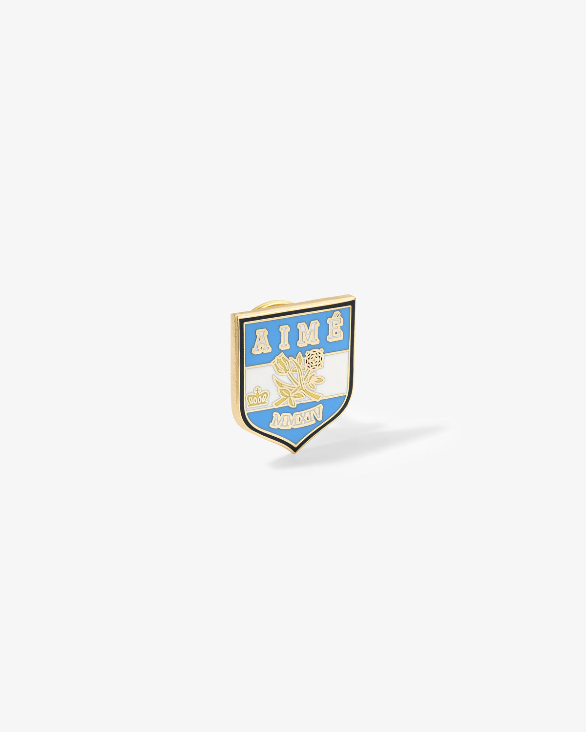 Shield-shaped Graphic Pin with AIMÉ & AMON, roses, blue, white & gold details on a white background.