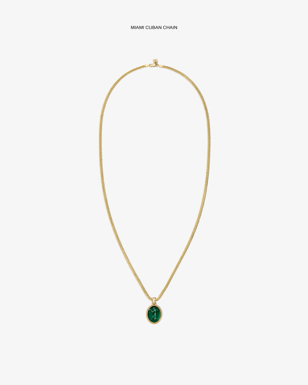 14Kt Gold Euterpe Relief Pendant: a gold chain necklace with an oval pendant featuring a green stone inlay.