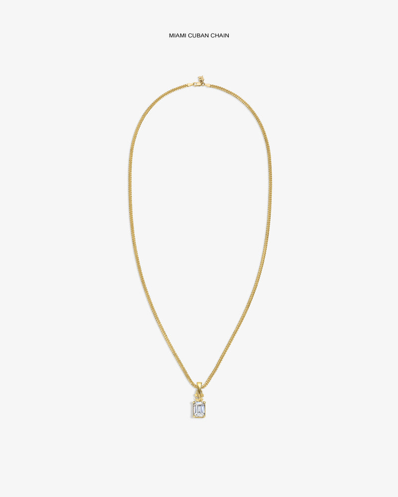 14Kt Gold Crest Gemstone Pendant on a Cuban chain, shown against a white background.