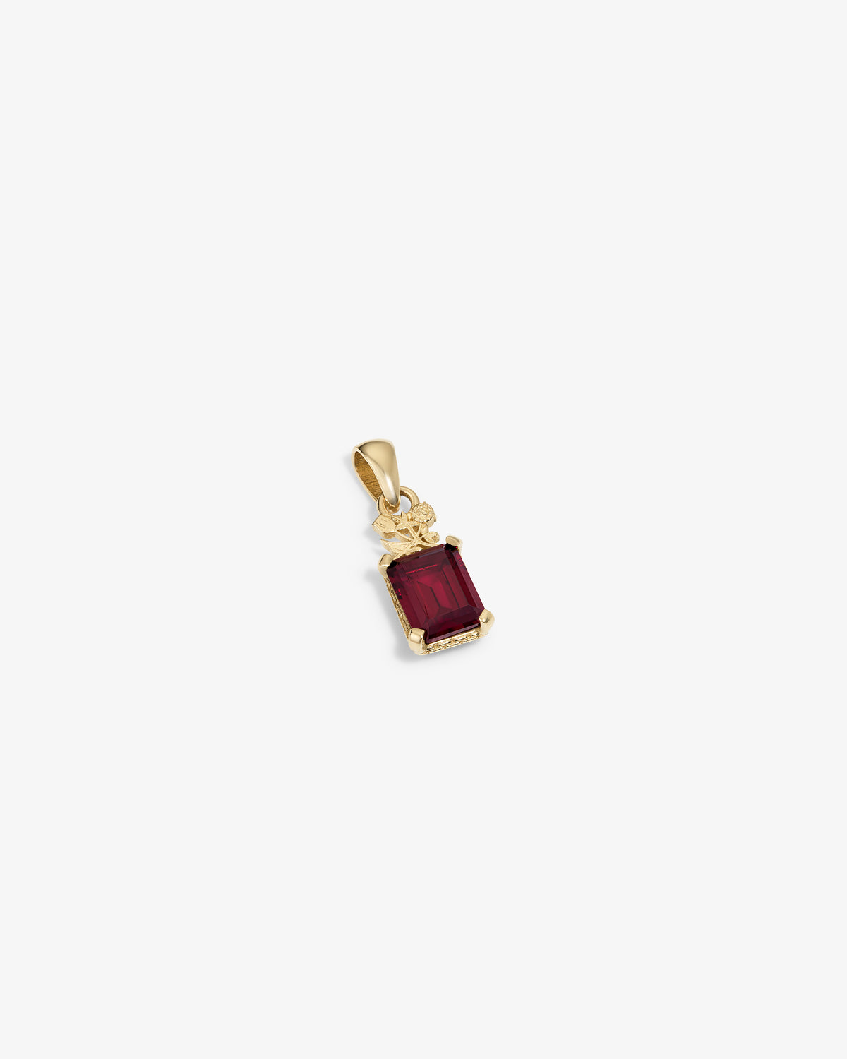 14Kt Gold Crest Gemstone Pendant featuring a rectangular red stone with decorative accents on a white background.