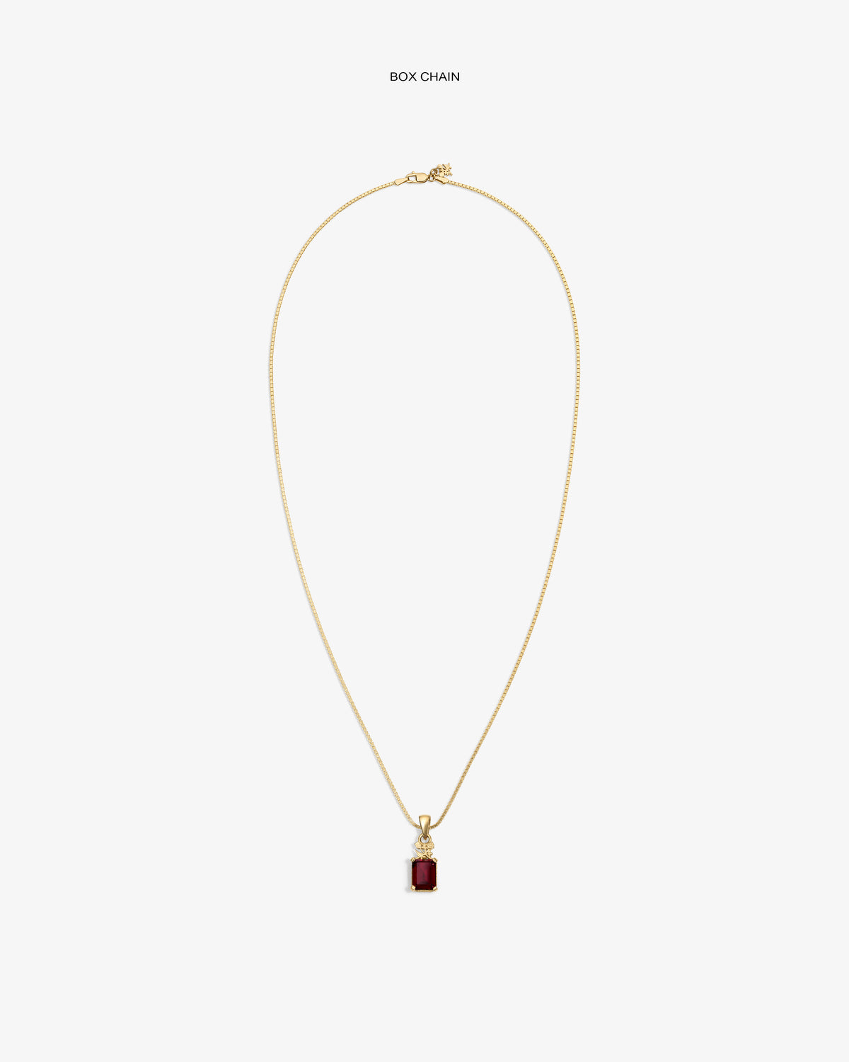 14Kt Gold Crest Gemstone Pendant on box chain, shown with red rectangular stone against a white background.
