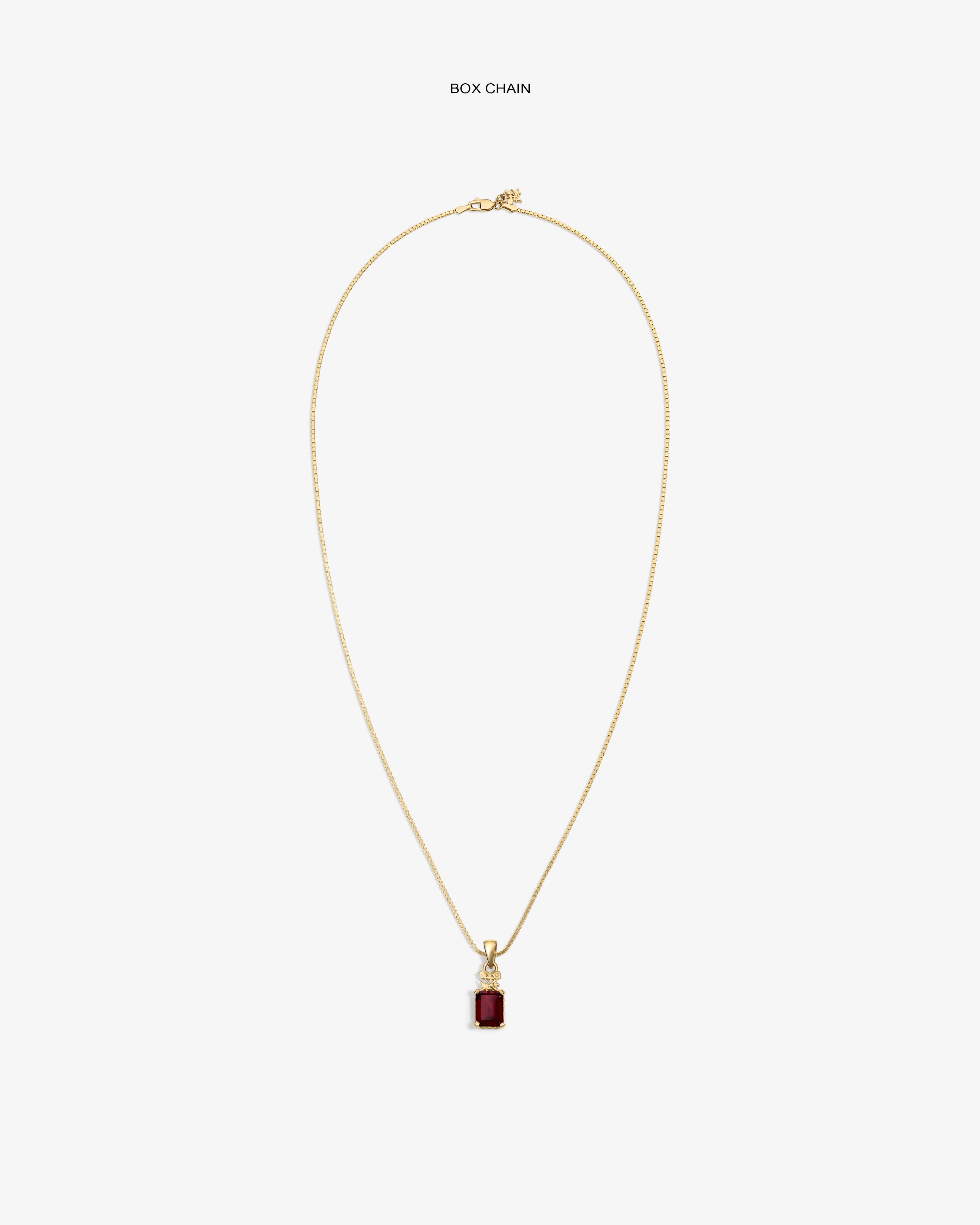 14Kt Gold Crest Gemstone Pendant on box chain, shown with red rectangular stone against a white background.