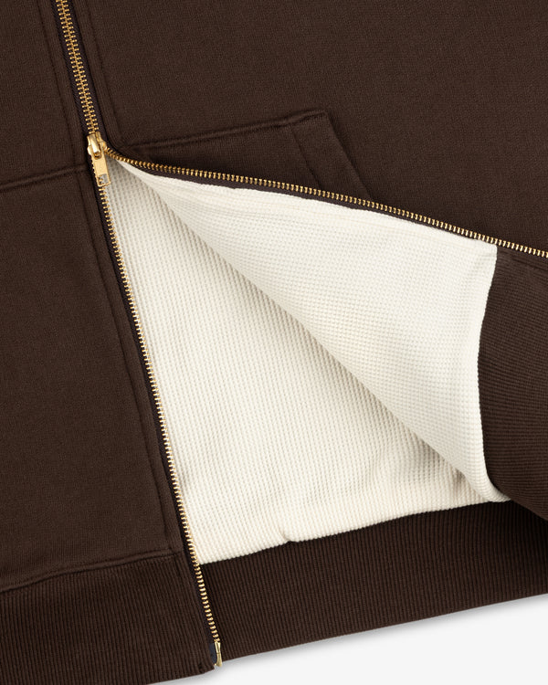Unisphere Waffle Lined Full-Zip Hoodie in brown, gold zipper, partially open to show its textured white lining.