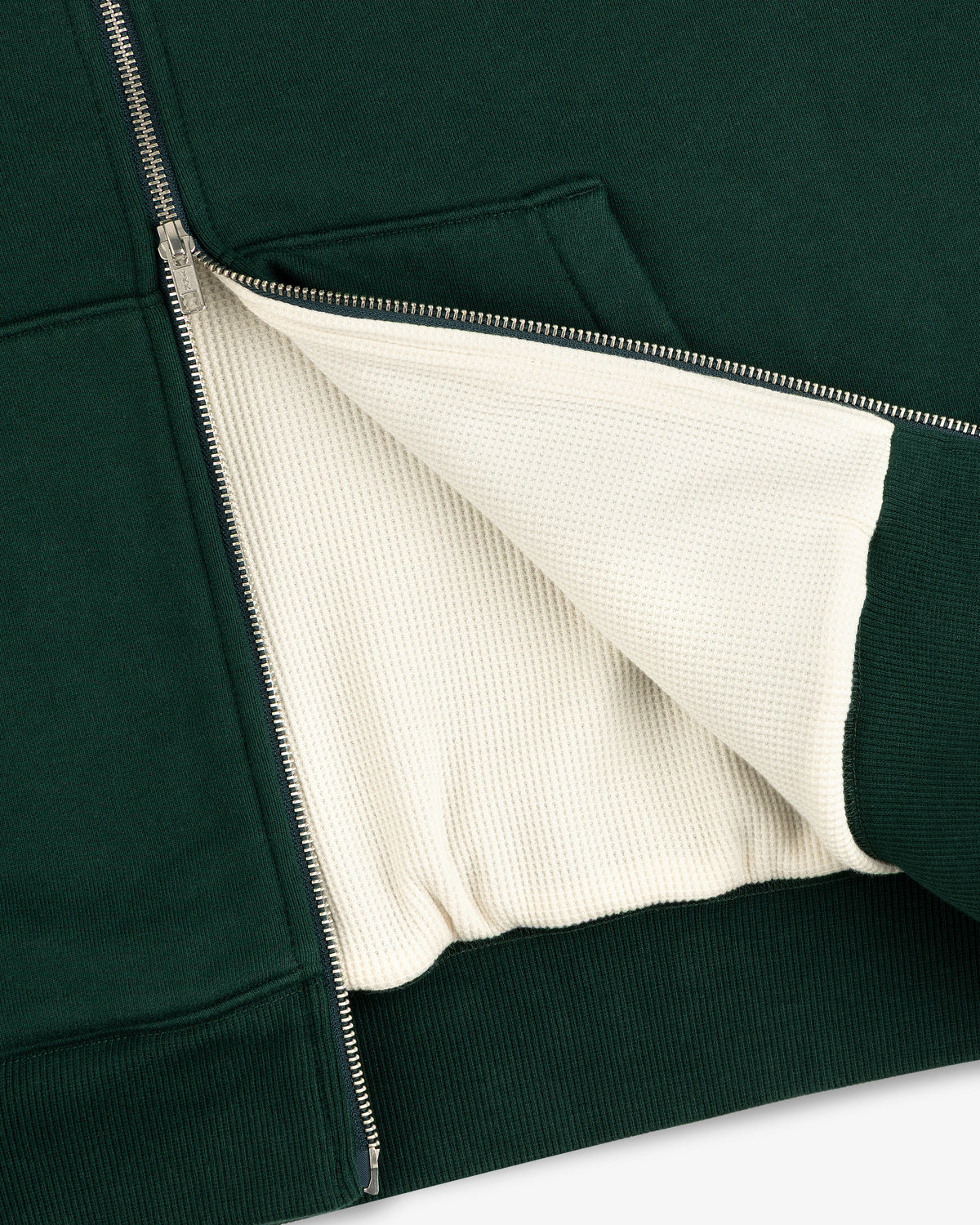 Unisphere Waffle Lined Full-Zip Hoodie in dark green with a visible cream textured lining.