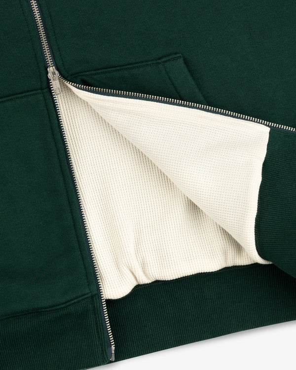 Unisphere Waffle Lined Full-Zip Hoodie in dark green with a visible cream textured lining.
