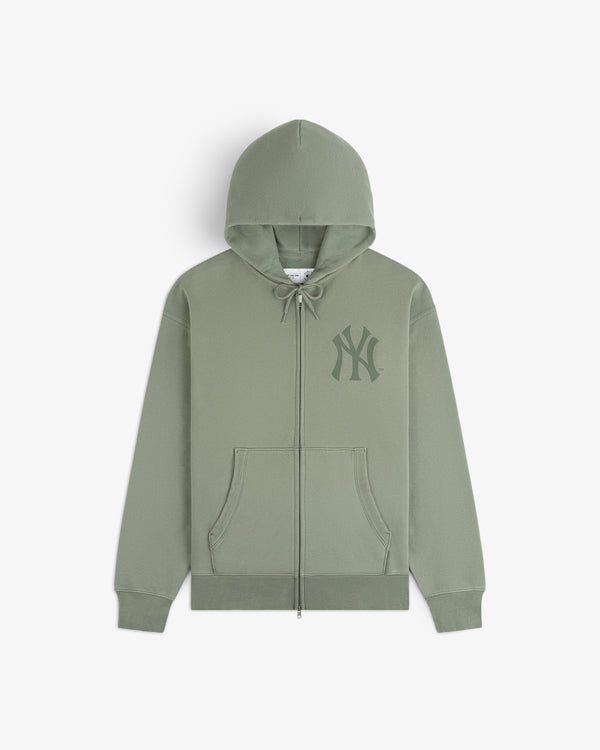 Yankees Washed Full-Zip Hoodie in light green with front pockets and logo on chest, shown flat on white background.
