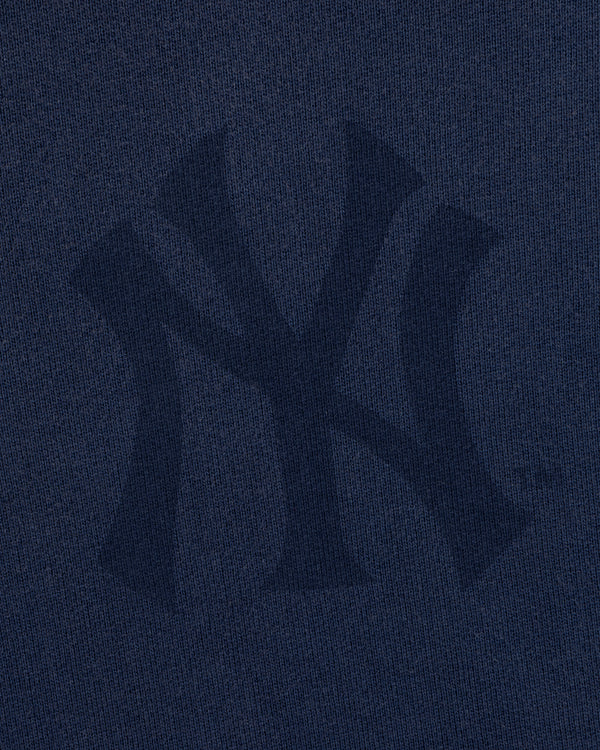Navy Yankees Washed Full-Zip Hoodie with a subtle, dark NY logo pattern woven into the fabric.