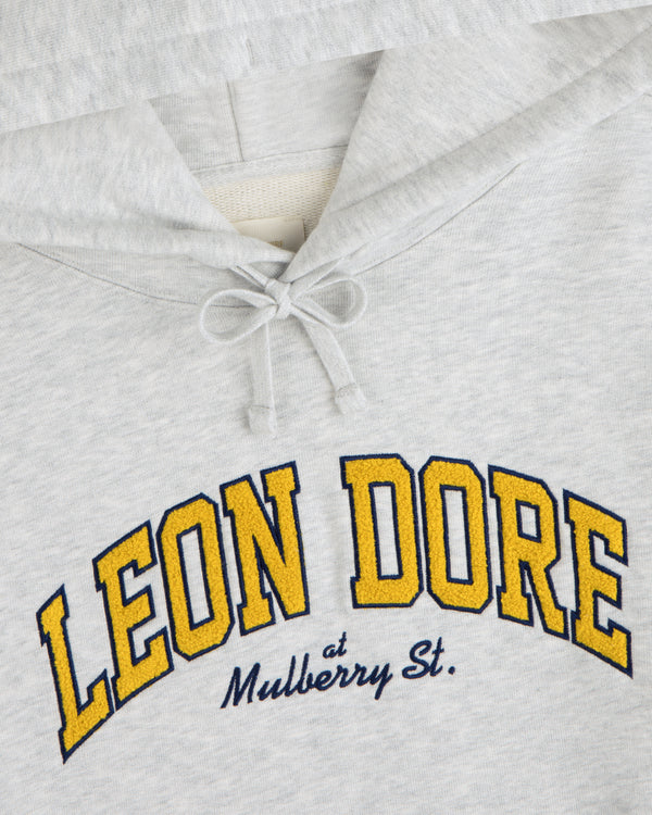Mulberry Letterman Hoodie: Gray with LEON DORE yellow/blue and Mulberry St. in blue cursive below.