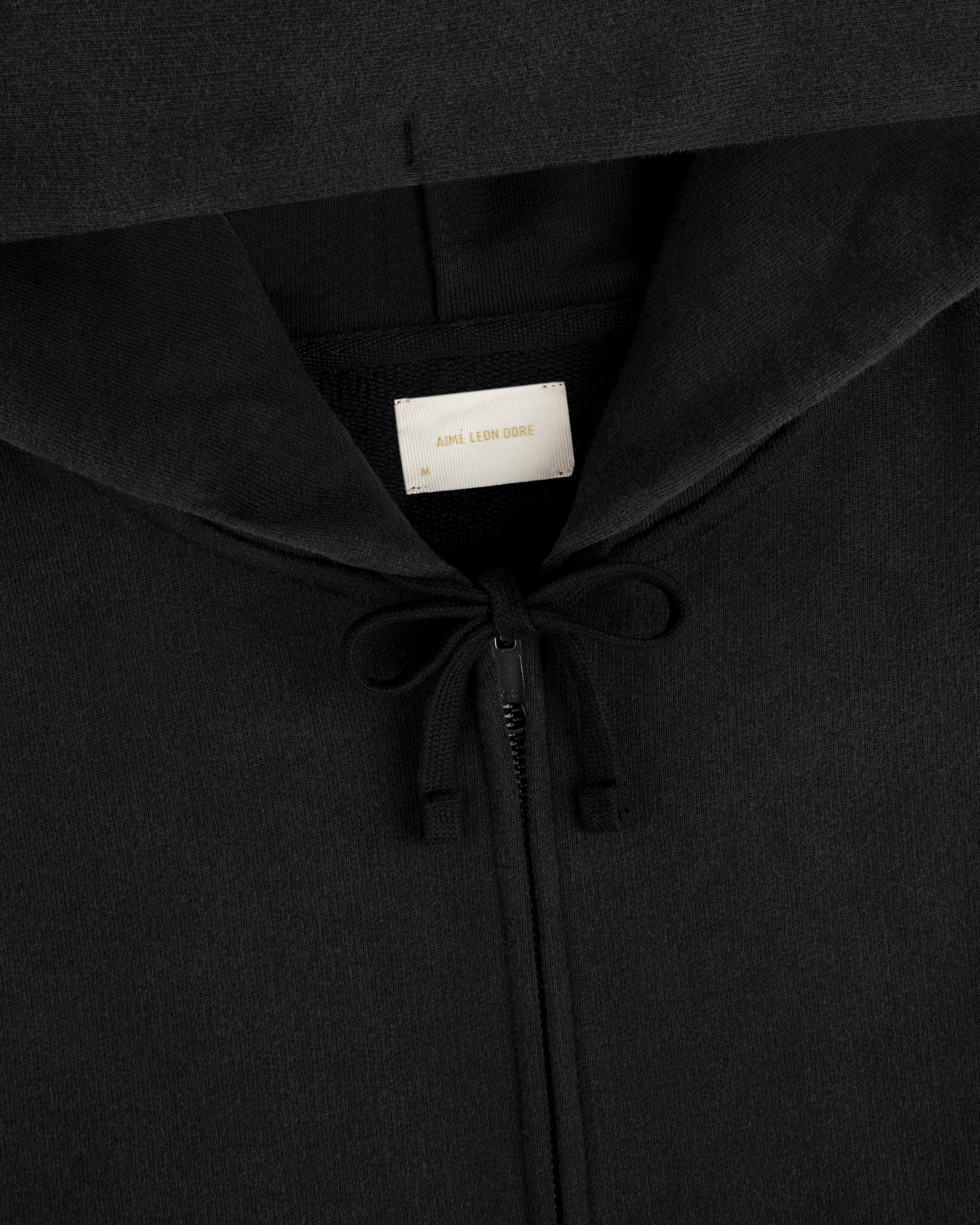 Black Washed Full Zip Hoodie with a drawcord and branded neck label.