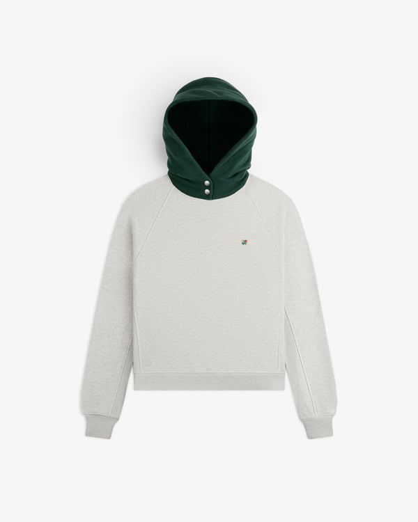 Colorblock Crest Snap Hoodie: light grey long-sleeve sweatshirt with a dark green hood featuring two silver neck snaps.