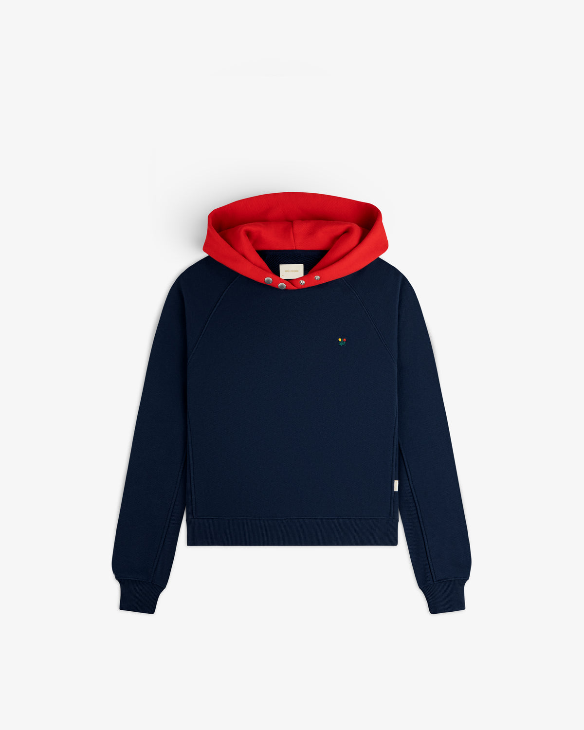 Colorblock Crest Snap Hoodie in navy blue with a bright red hood and two snaps at the neckline.