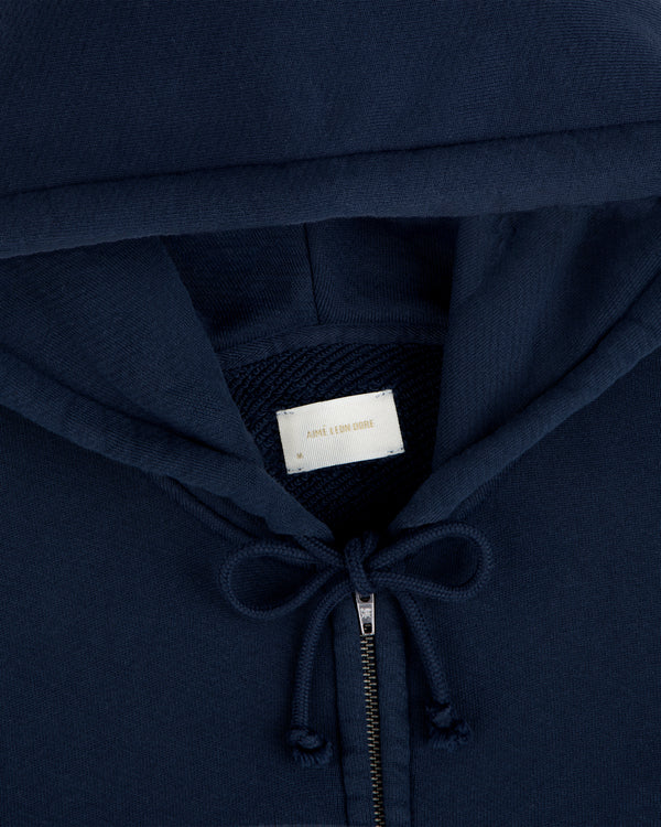 Dark navy Script Full Zip Hoodie with a branded interior neck label and drawstring hood.