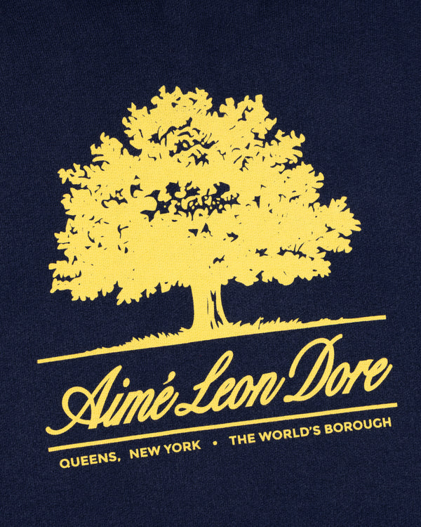 Yellow graphic of an olive tree on an Olive Tree Hoodie with Aimé Leon Dore, Queens, New York, and The Worlds Borough text.