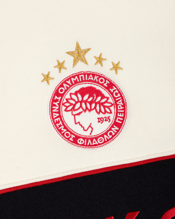 ALD / Olympiacos F.C. Full Zip Hoodie logo: an embroidered laurel-crowned head, Greek text, and four gold stars.
