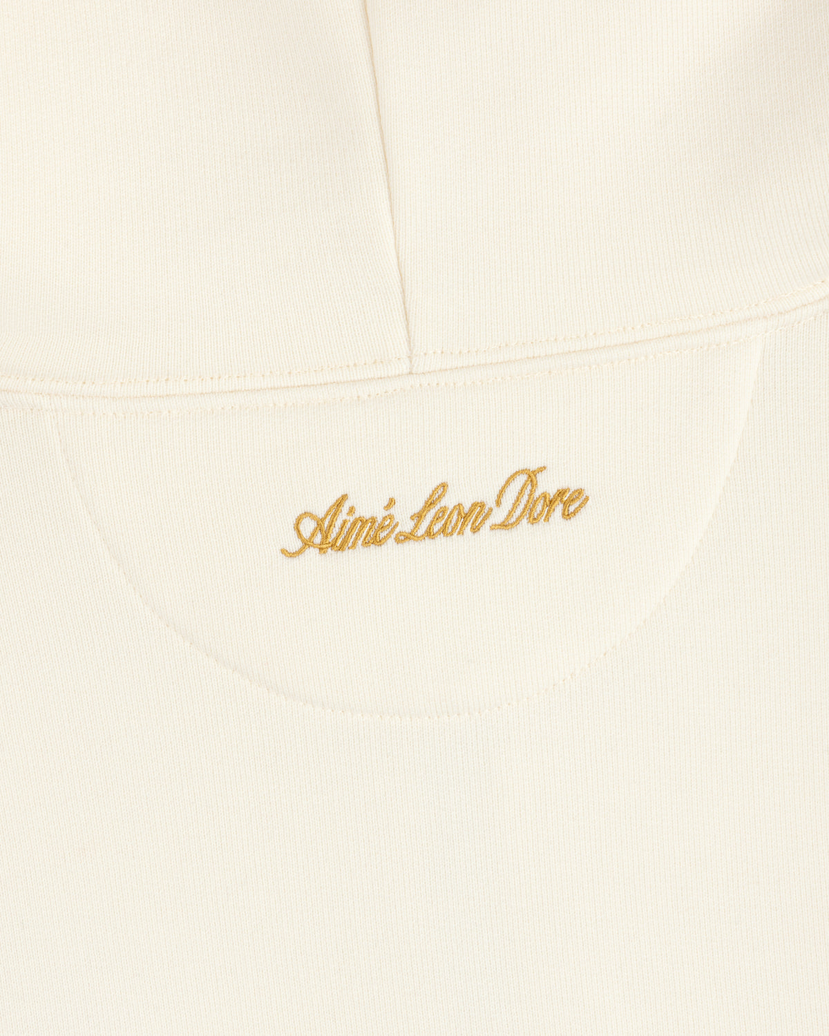 Off-white ALD / Olympiacos F.C. Full Zip Hoodie with Aimé Leon Dore embroidered in gold thread on the back.