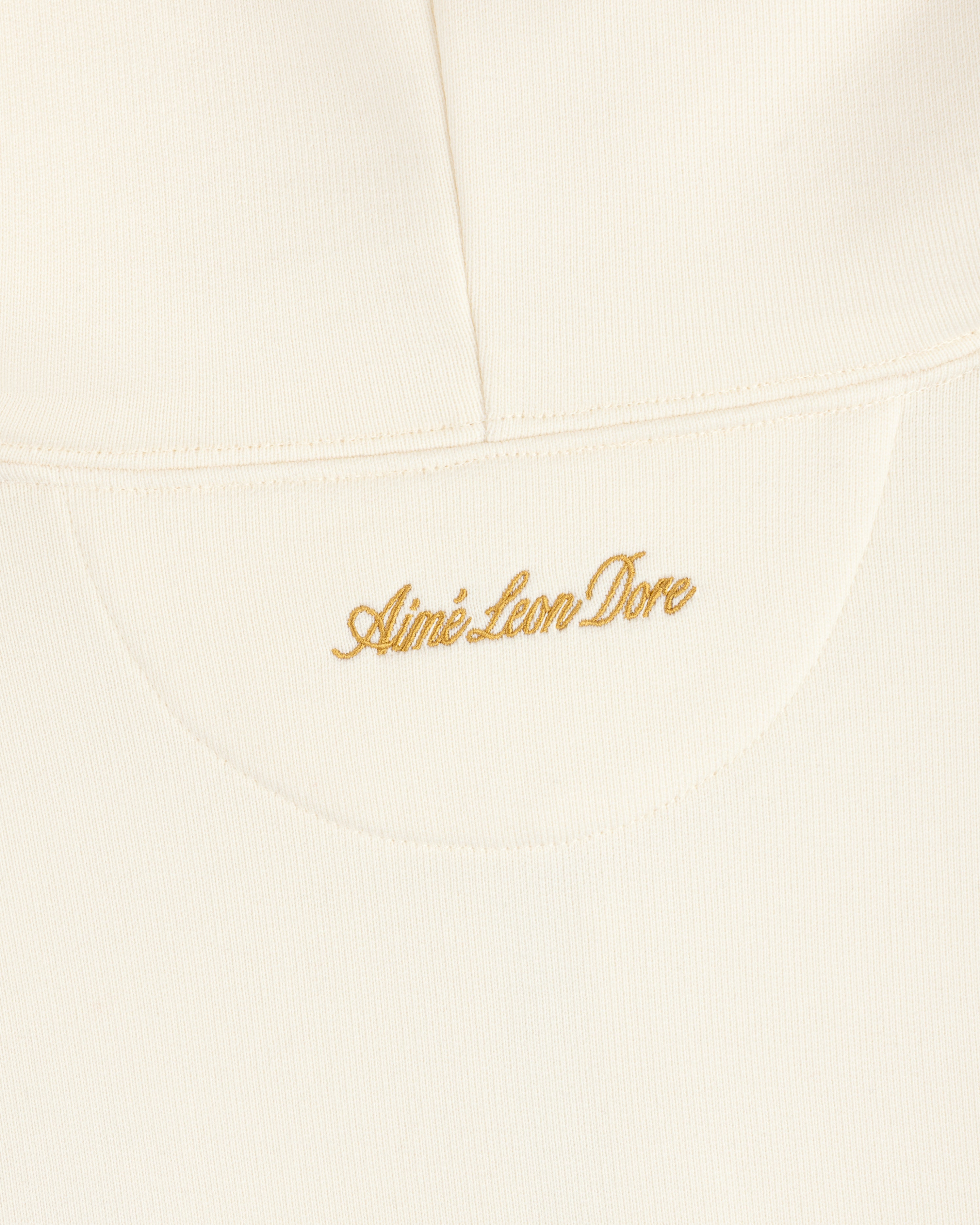 Off-white ALD / Olympiacos F.C. Full Zip Hoodie with Aimé Leon Dore embroidered in gold thread on the back.