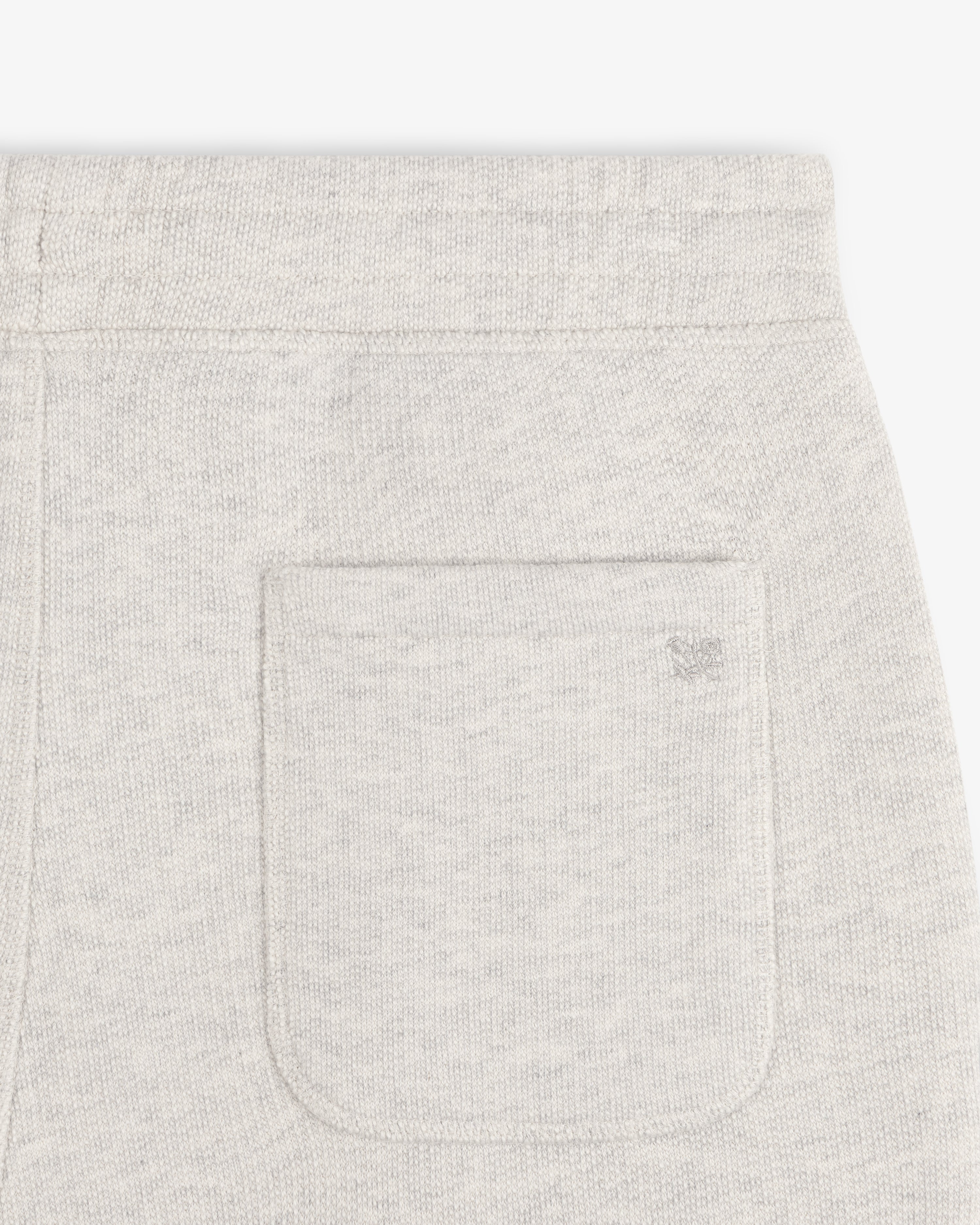 Stone Washed Marina Sweatpants in light gray with textured fabric, back pocket, and subtle embroidered logo.