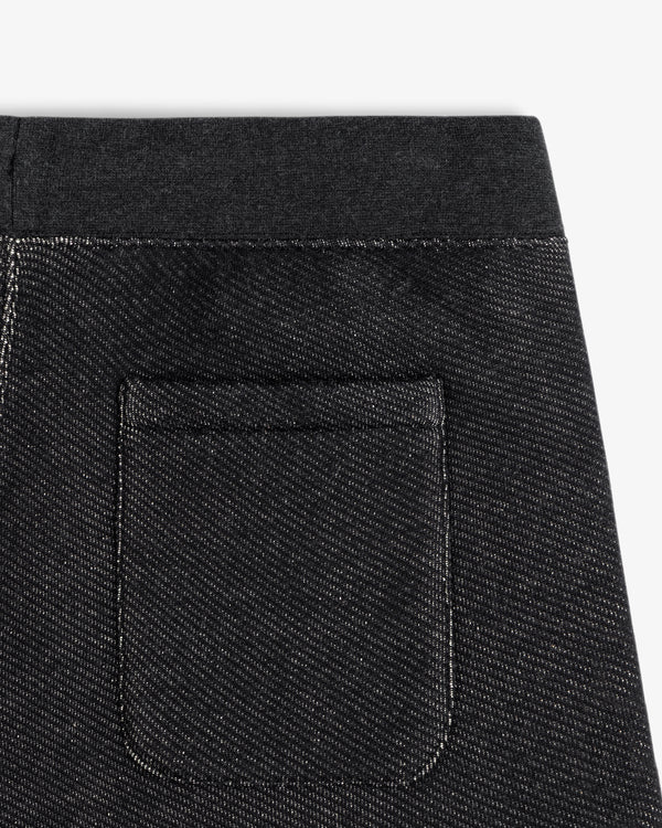 Close-up of the back pocket and waistband of dark gray Terry Lounge Sweatpant with a diagonal texture.