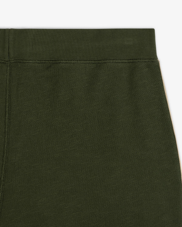 Close-up of the waistband and upper section of Saint George Track Pant in olive green against a white background.
