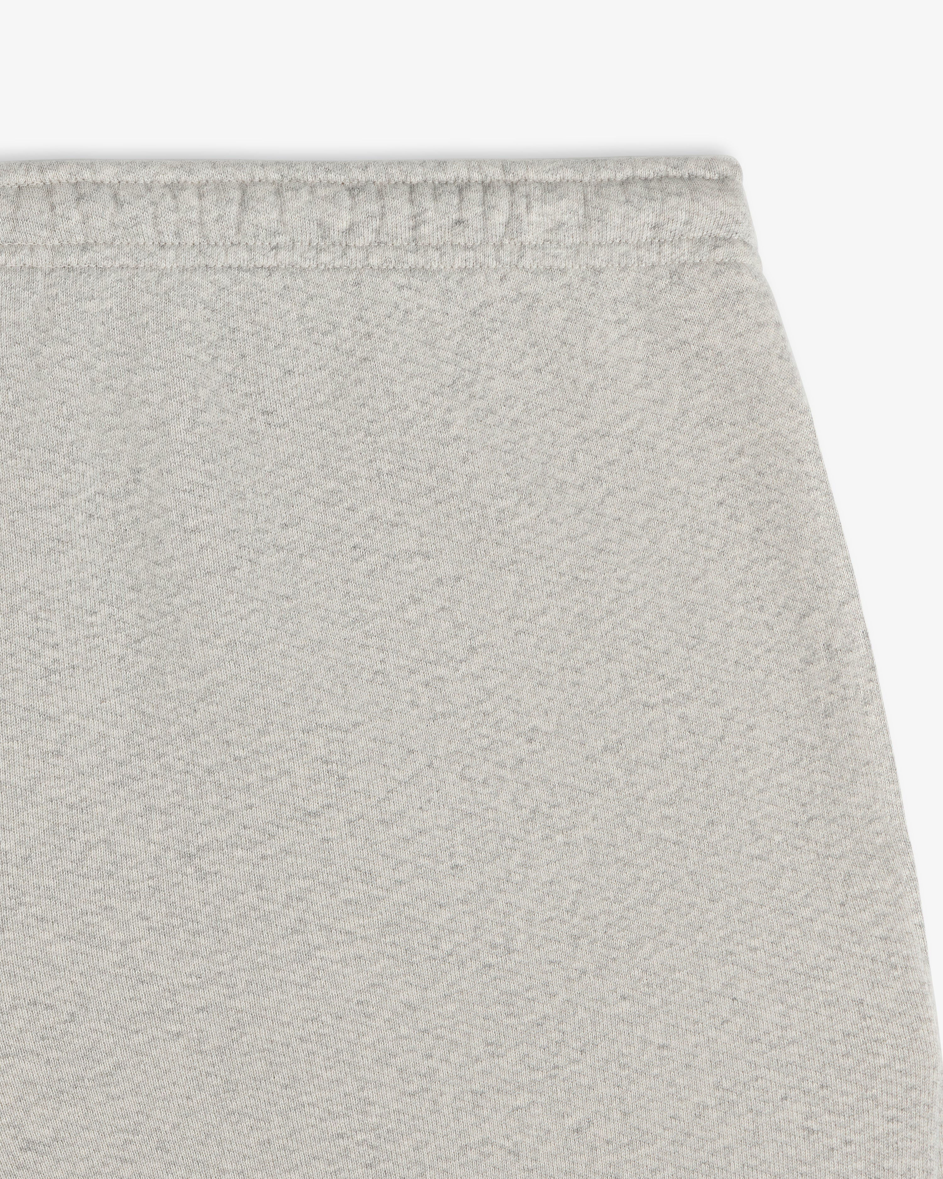 Close-up of the heathered grey elastic waistband of Script Sweatpant sweatpants.
