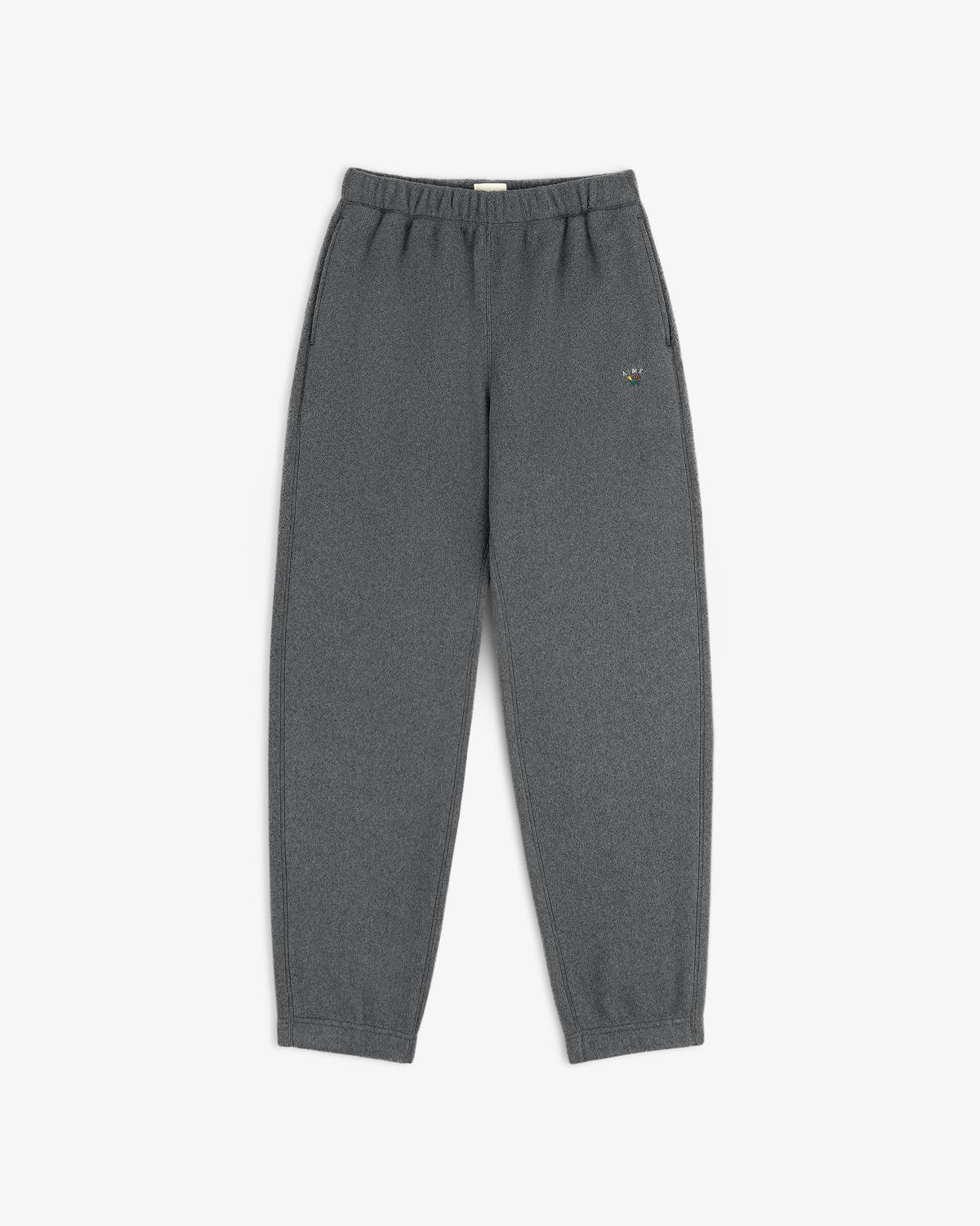 Crest Fleece Sweatpant in dark gray with elastic waist and cuffs, displayed flat on a white background.