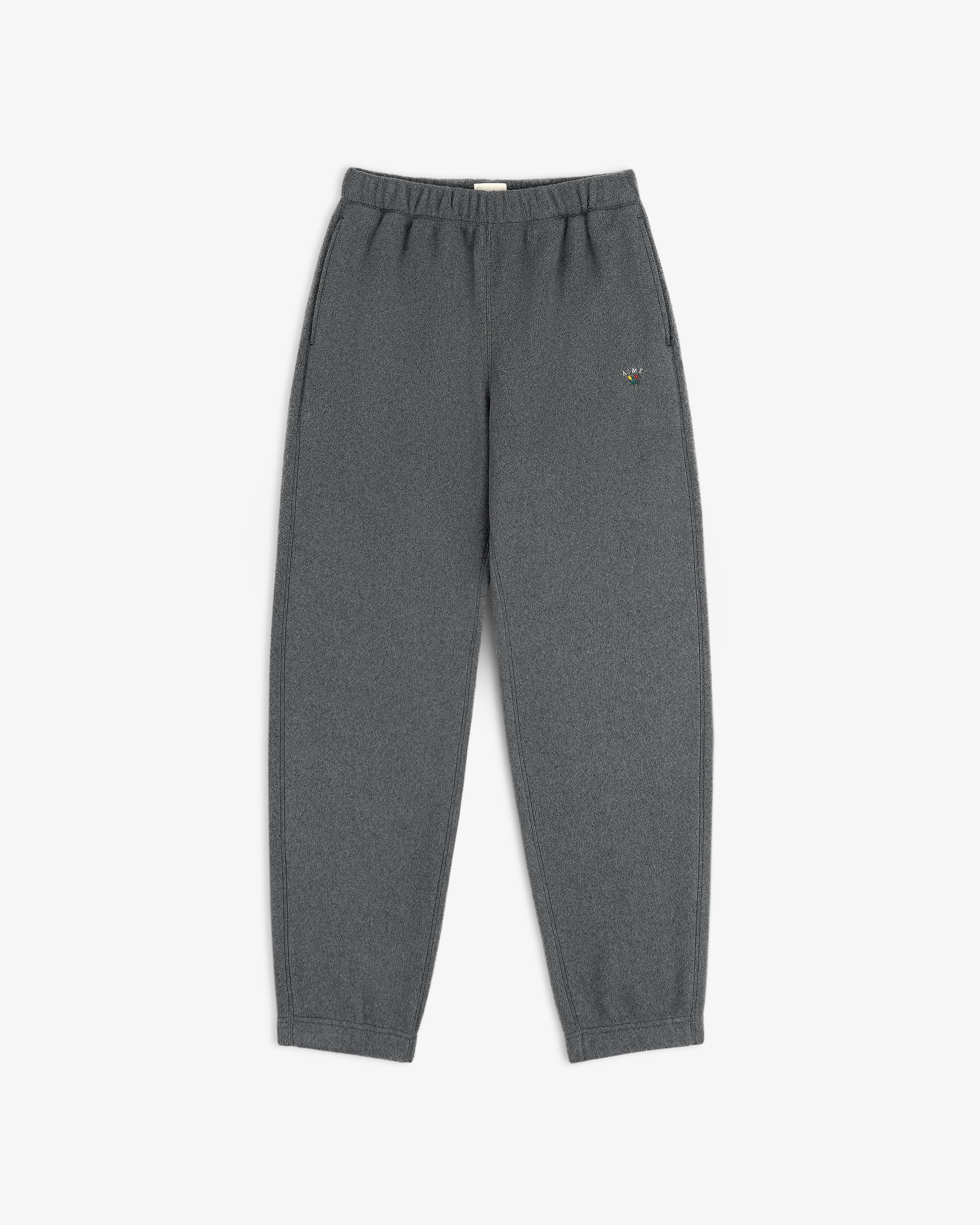 Crest Fleece Sweatpant in dark gray with elastic waist and cuffs, displayed flat on a white background.