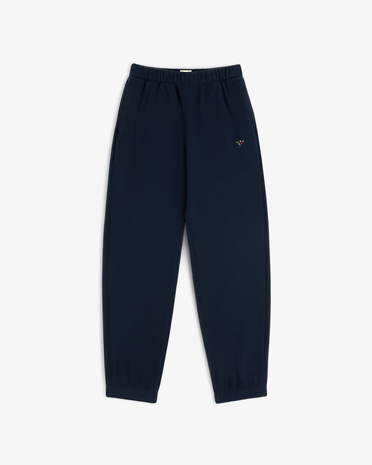 Crest Fleece Sweatpant: navy blue with elastic waist/cuffs and small embroidered logo on the left thigh.