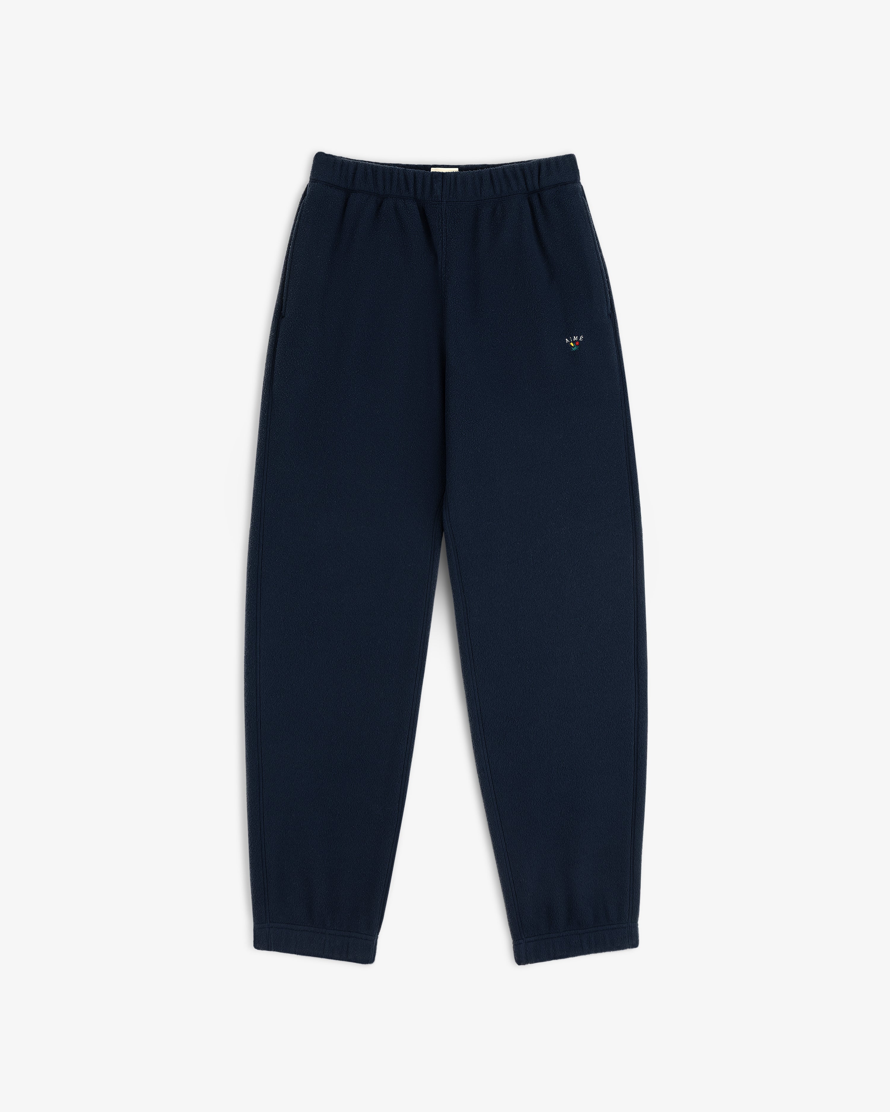 Crest Fleece Sweatpant: navy blue with elastic waist/cuffs and small embroidered logo on the left thigh.
