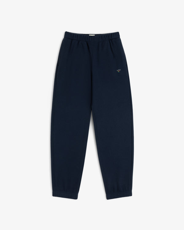 Crest Fleece Sweatpant: navy blue with elastic waist/cuffs and small embroidered logo on the left thigh.