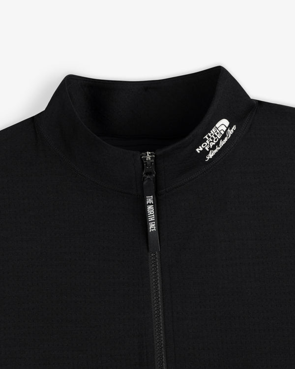 Close-up of the black ALD / The North Face DOTKNIT™ Wool Quarter Zip with zipper and white logo on the collar.