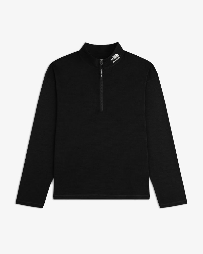 ALD / The North Face DOTKNIT™ Wool Quarter Zip in black with a white logo on the left shoulder.
