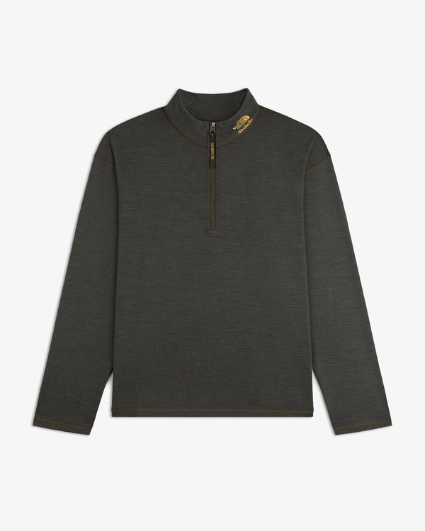 ALD/The North Face DOTKNIT™ Wool Quarter Zip in dark gray with yellow collar logo, shown flat on white background.