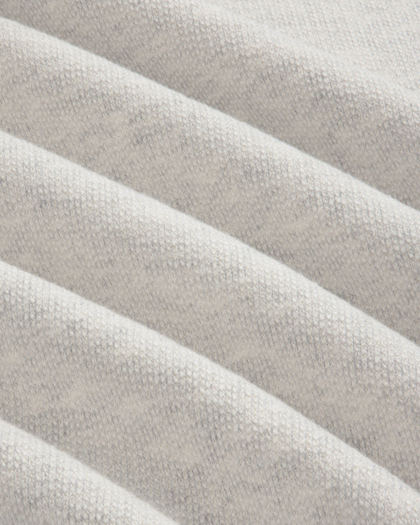 Close-up of Stone Washed Marina Crewneck Sweatshirt in white, showing diagonal ridges and a soft, woven texture.